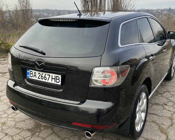 Чорний Мазда СХ-7, об'ємом двигуна 2.3 л та пробігом 113 тис. км за 11000 $, фото 6 на Automoto.ua