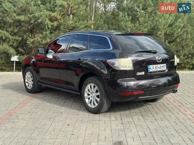 Черный Мазда СХ-7, объемом двигателя 2.5 л и пробегом 240 тыс. км за 6990 $, фото 4 на Automoto.ua