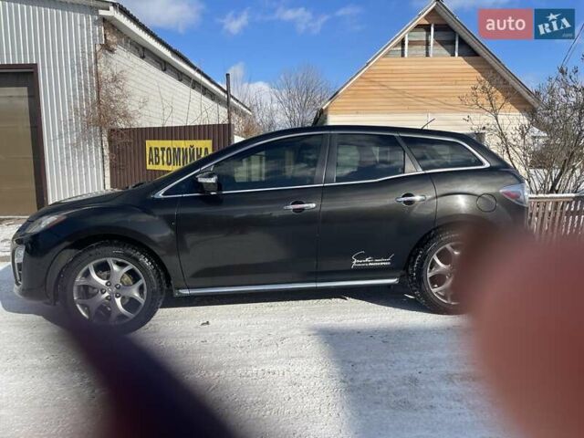 Черный Мазда СХ-7, объемом двигателя 2.26 л и пробегом 172 тыс. км за 12000 $, фото 4 на Automoto.ua
