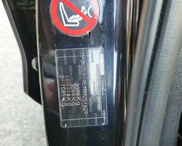 Черный Мазда СХ-7, объемом двигателя 2.5 л и пробегом 190 тыс. км за 12000 $, фото 16 на Automoto.ua