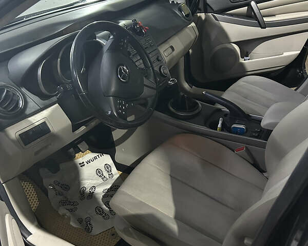 Черный Мазда СХ-7, объемом двигателя 2.2 л и пробегом 99 тыс. км за 11000 $, фото 5 на Automoto.ua