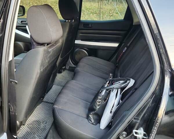 Черный Мазда СХ-7, объемом двигателя 2.5 л и пробегом 190 тыс. км за 12000 $, фото 1 на Automoto.ua