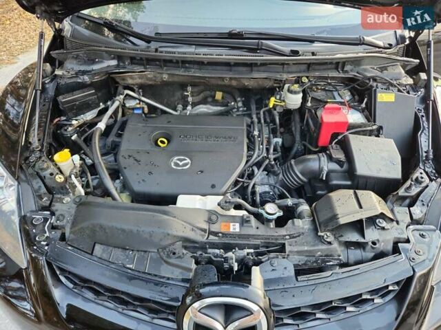 Черный Мазда СХ-7, объемом двигателя 2.5 л и пробегом 190 тыс. км за 12000 $, фото 17 на Automoto.ua