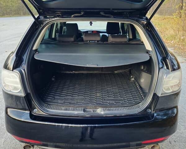 Черный Мазда СХ-7, объемом двигателя 2.5 л и пробегом 190 тыс. км за 12000 $, фото 11 на Automoto.ua