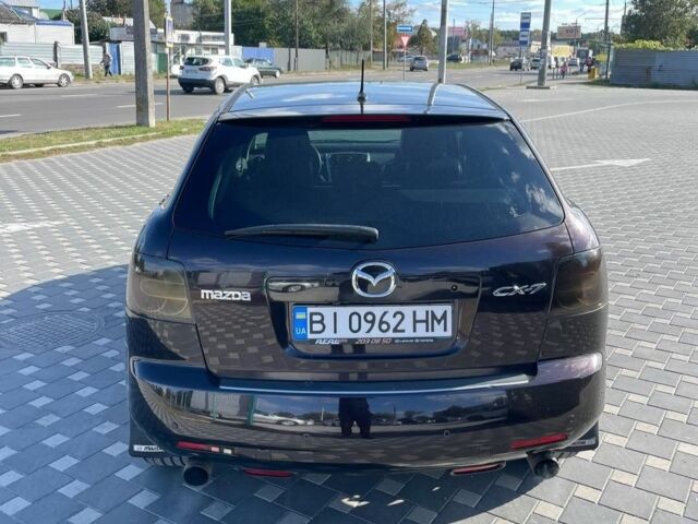 Фиолетовый Мазда СХ-7, объемом двигателя 2.3 л и пробегом 270 тыс. км за 6200 $, фото 5 на Automoto.ua