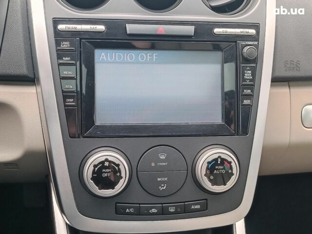 Фіолетовий Мазда СХ-7, об'ємом двигуна 2.3 л та пробігом 176 тис. км за 7890 $, фото 29 на Automoto.ua