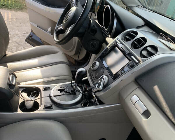 Фиолетовый Мазда СХ-7, объемом двигателя 2.3 л и пробегом 160 тыс. км за 9000 $, фото 6 на Automoto.ua