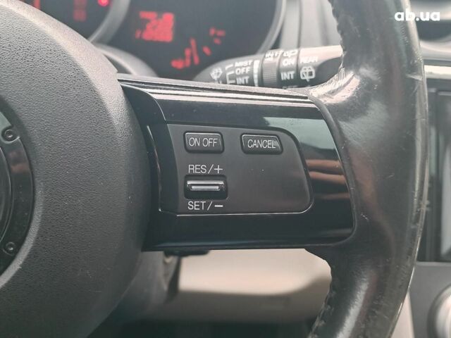 Фіолетовий Мазда СХ-7, об'ємом двигуна 2.3 л та пробігом 176 тис. км за 7890 $, фото 27 на Automoto.ua