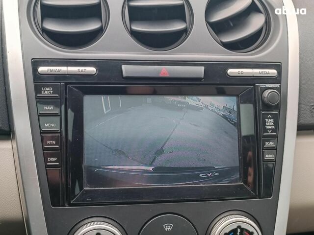 Фіолетовий Мазда СХ-7, об'ємом двигуна 2.3 л та пробігом 176 тис. км за 7890 $, фото 28 на Automoto.ua