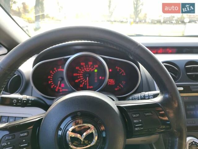Мазда СХ-7 2008 в Первомайск на Automoto.ua Фиолетовый Мазда СХ-7, объемом двигателя 2.26 л и пробегом 152 тыс. км за 8900 $, фото 7 на Automoto.ua