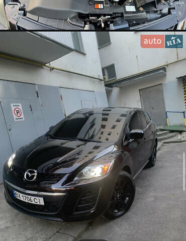 Фиолетовый Мазда СХ-7, объемом двигателя 2.5 л и пробегом 160 тыс. км за 12000 $, фото 1 на Automoto.ua