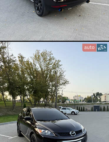 Фиолетовый Мазда СХ-7, объемом двигателя 2.5 л и пробегом 160 тыс. км за 12000 $, фото 5 на Automoto.ua