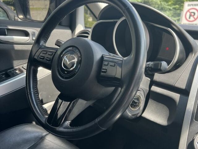 Коричневый Мазда СХ-7, объемом двигателя 2.3 л и пробегом 213 тыс. км за 6550 $, фото 7 на Automoto.ua