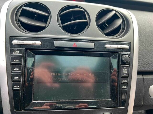 Коричневый Мазда СХ-7, объемом двигателя 2.3 л и пробегом 214 тыс. км за 6940 $, фото 17 на Automoto.ua