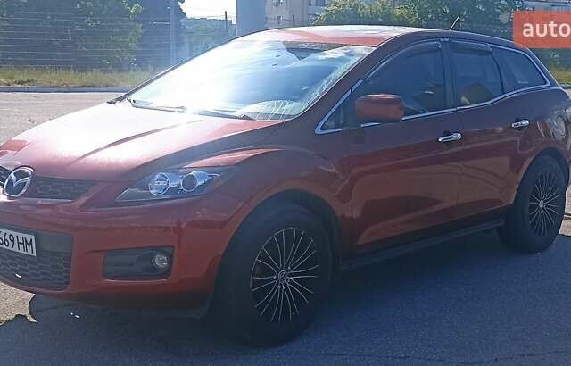 Красный Мазда СХ-7, объемом двигателя 2.3 л и пробегом 145 тыс. км за 6700 $, фото 4 на Automoto.ua