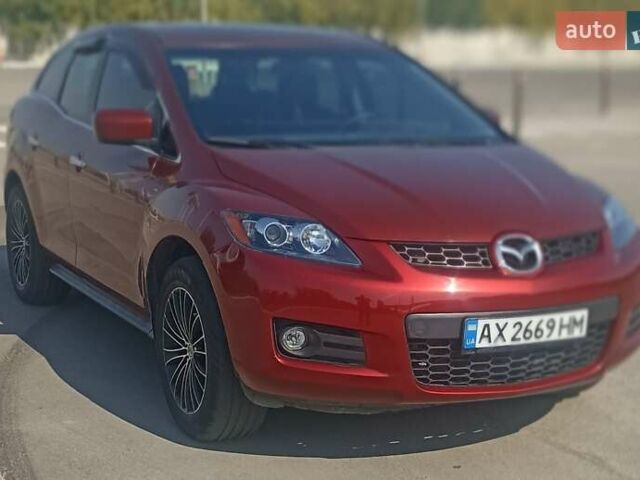 Красный Мазда СХ-7, объемом двигателя 2.3 л и пробегом 145 тыс. км за 6700 $, фото 9 на Automoto.ua