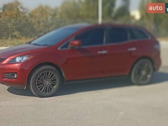 Красный Мазда СХ-7, объемом двигателя 2.3 л и пробегом 145 тыс. км за 6700 $, фото 6 на Automoto.ua