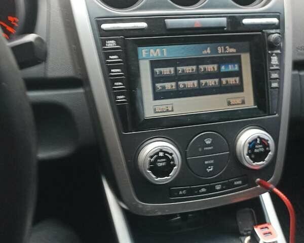 Красный Мазда СХ-7, объемом двигателя 2.3 л и пробегом 145 тыс. км за 6700 $, фото 5 на Automoto.ua