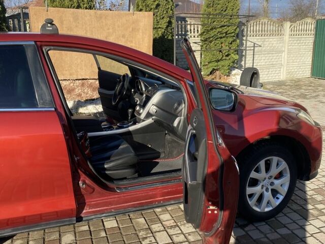 Красный Мазда СХ-7, объемом двигателя 2.3 л и пробегом 176 тыс. км за 6800 $, фото 3 на Automoto.ua