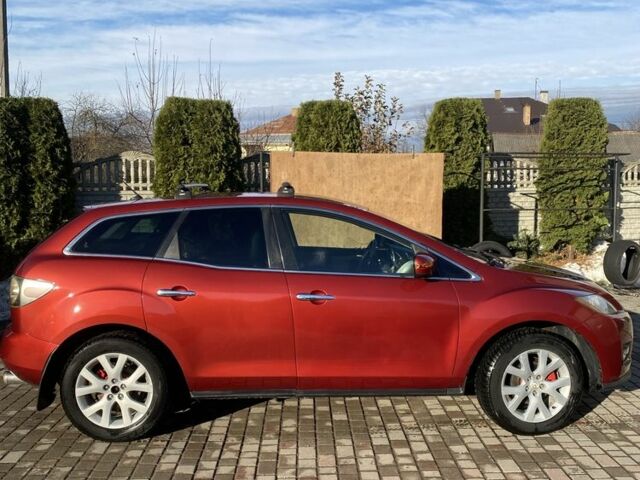 Красный Мазда СХ-7, объемом двигателя 2.3 л и пробегом 176 тыс. км за 6800 $, фото 1 на Automoto.ua