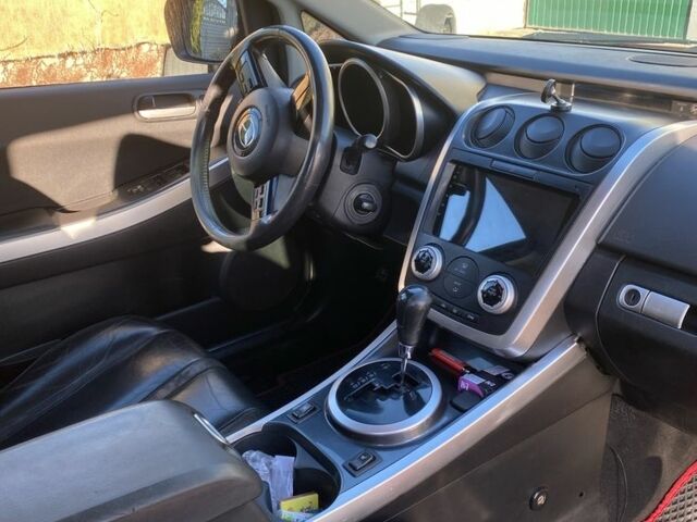 Красный Мазда СХ-7, объемом двигателя 2.3 л и пробегом 176 тыс. км за 6800 $, фото 4 на Automoto.ua