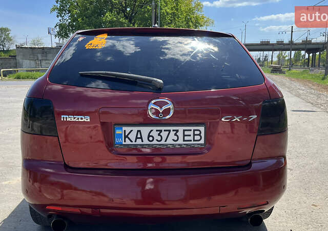 Красный Мазда СХ-7, объемом двигателя 2.26 л и пробегом 140 тыс. км за 5900 $, фото 10 на Automoto.ua