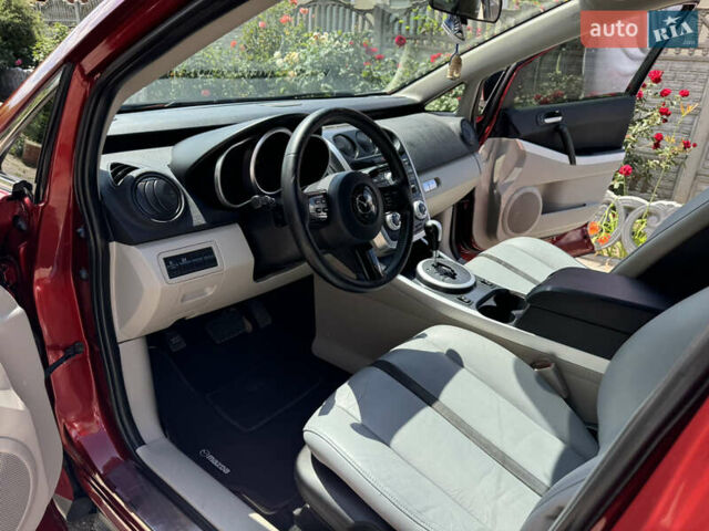 Красный Мазда СХ-7, объемом двигателя 2.3 л и пробегом 124 тыс. км за 6400 $, фото 21 на Automoto.ua
