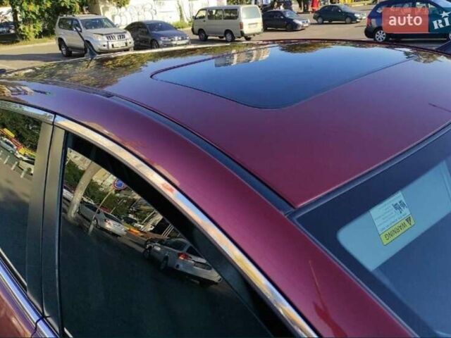 Красный Мазда СХ-7, объемом двигателя 2.3 л и пробегом 300 тыс. км за 7000 $, фото 3 на Automoto.ua