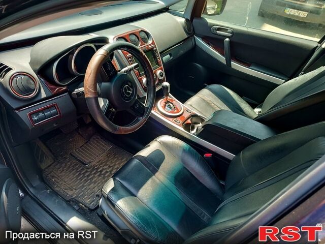 Красный Мазда СХ-7, объемом двигателя 2.3 л и пробегом 95 тыс. км за 6300 $, фото 3 на Automoto.ua