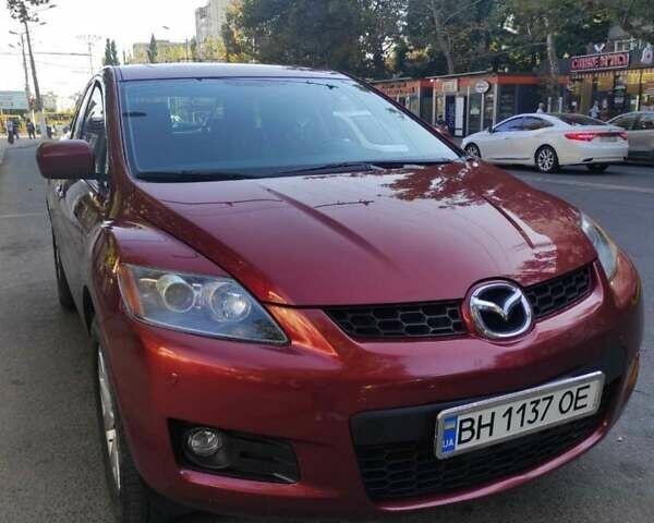 Красный Мазда СХ-7, объемом двигателя 2.3 л и пробегом 300 тыс. км за 7000 $, фото 4 на Automoto.ua
