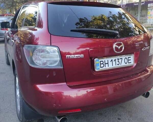 Красный Мазда СХ-7, объемом двигателя 2.3 л и пробегом 300 тыс. км за 7000 $, фото 5 на Automoto.ua