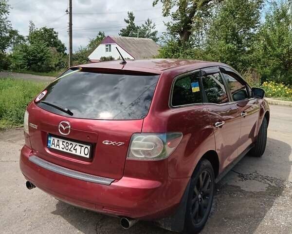 Красный Мазда СХ-7, объемом двигателя 2.26 л и пробегом 196 тыс. км за 7100 $, фото 5 на Automoto.ua