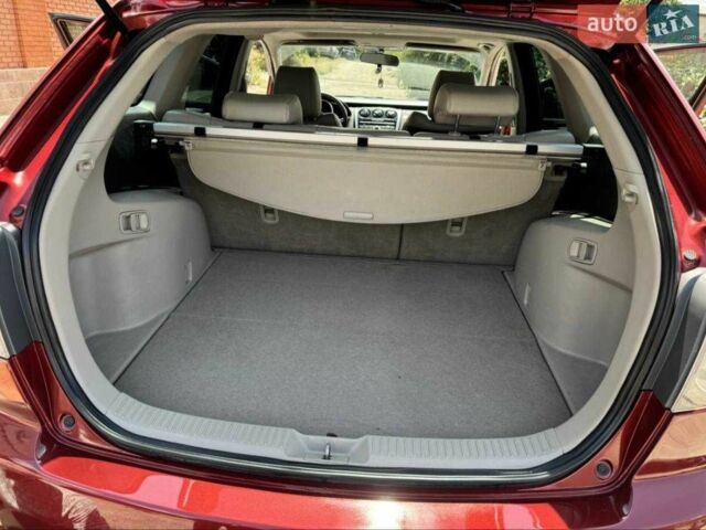 Червоний Мазда СХ-7, об'ємом двигуна 2.3 л та пробігом 180 тис. км за 7000 $, фото 12 на Automoto.ua