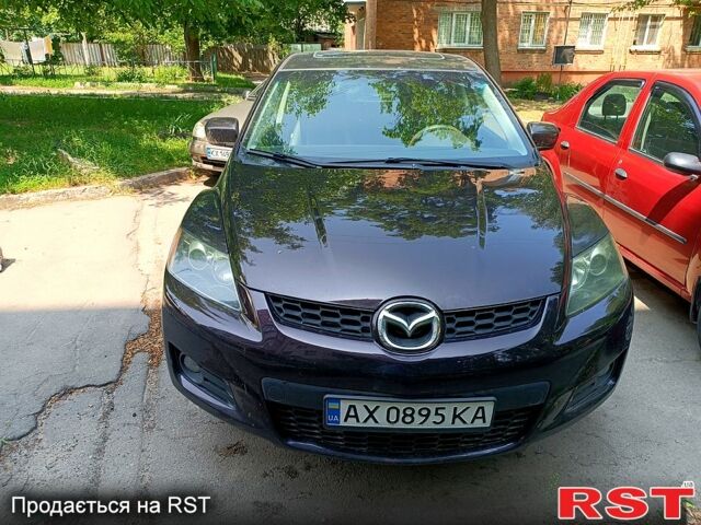 Красный Мазда СХ-7, объемом двигателя 2.3 л и пробегом 95 тыс. км за 6300 $, фото 1 на Automoto.ua