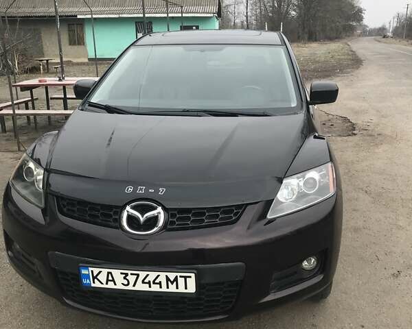 Красный Мазда СХ-7, объемом двигателя 2.26 л и пробегом 87 тыс. км за 8500 $, фото 3 на Automoto.ua