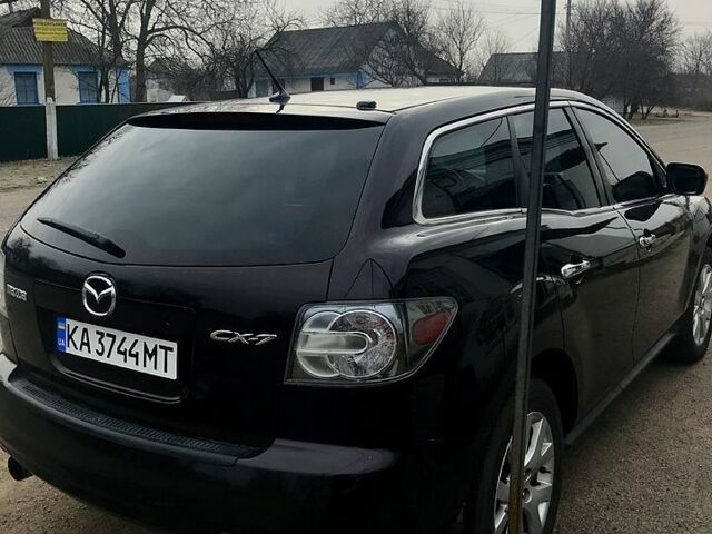 Красный Мазда СХ-7, объемом двигателя 2.3 л и пробегом 87 тыс. км за 7999 $, фото 3 на Automoto.ua