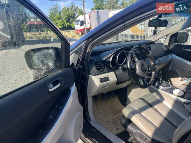 Красный Мазда СХ-7, объемом двигателя 2.26 л и пробегом 155 тыс. км за 6300 $, фото 1 на Automoto.ua