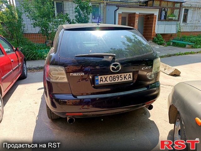 Красный Мазда СХ-7, объемом двигателя 2.3 л и пробегом 95 тыс. км за 6300 $, фото 5 на Automoto.ua