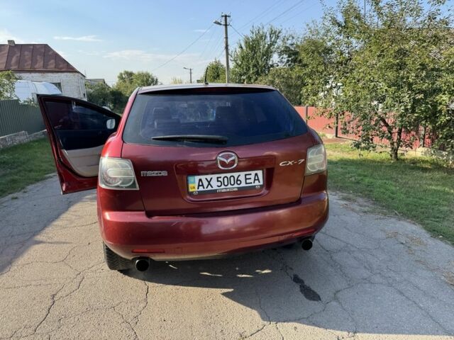 Красный Мазда СХ-7, объемом двигателя 2.3 л и пробегом 147 тыс. км за 3800 $, фото 7 на Automoto.ua