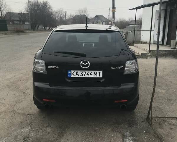 Красный Мазда СХ-7, объемом двигателя 2.26 л и пробегом 87 тыс. км за 8500 $, фото 6 на Automoto.ua