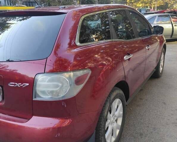 Красный Мазда СХ-7, объемом двигателя 2.3 л и пробегом 300 тыс. км за 7000 $, фото 7 на Automoto.ua