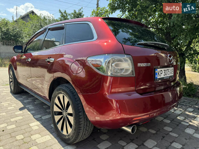 Красный Мазда СХ-7, объемом двигателя 2.3 л и пробегом 124 тыс. км за 6400 $, фото 6 на Automoto.ua