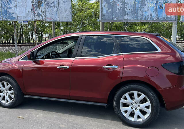 Красный Мазда СХ-7, объемом двигателя 2.26 л и пробегом 140 тыс. км за 5900 $, фото 4 на Automoto.ua
