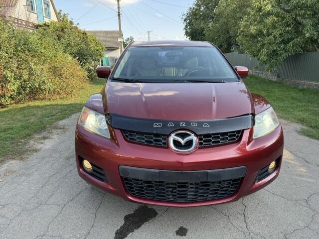 Красный Мазда СХ-7, объемом двигателя 2.3 л и пробегом 147 тыс. км за 3800 $, фото 1 на Automoto.ua