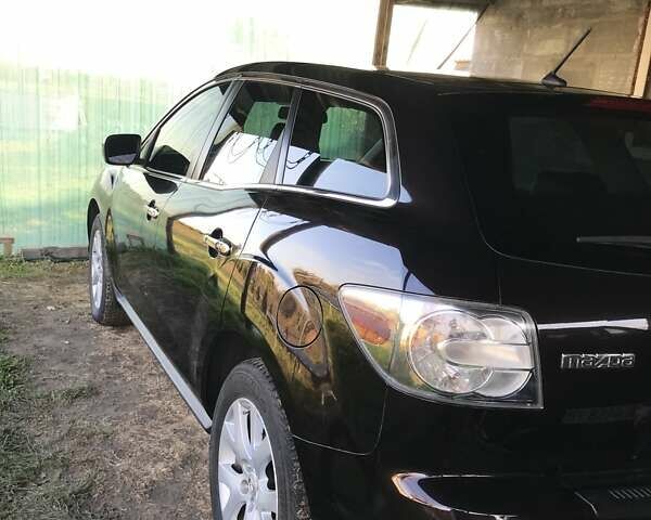 Красный Мазда СХ-7, объемом двигателя 2.26 л и пробегом 87 тыс. км за 8500 $, фото 9 на Automoto.ua