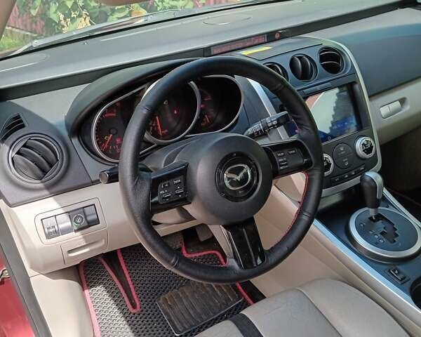 Красный Мазда СХ-7, объемом двигателя 2.26 л и пробегом 196 тыс. км за 7100 $, фото 9 на Automoto.ua