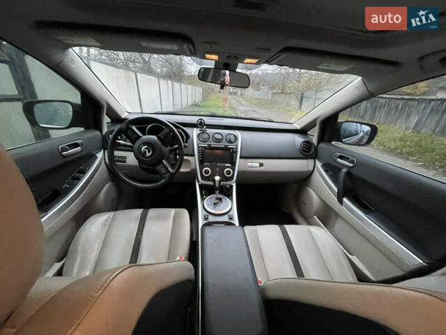 Красный Мазда СХ-7, объемом двигателя 2.26 л и пробегом 100 тыс. км за 5950 $, фото 12 на Automoto.ua