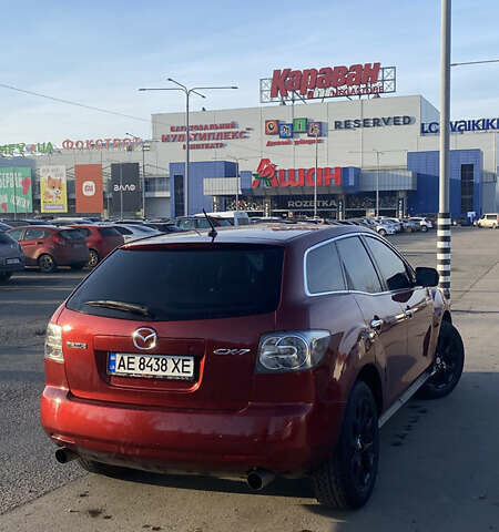 Красный Мазда СХ-7, объемом двигателя 2.3 л и пробегом 255 тыс. км за 6900 $, фото 1 на Automoto.ua
