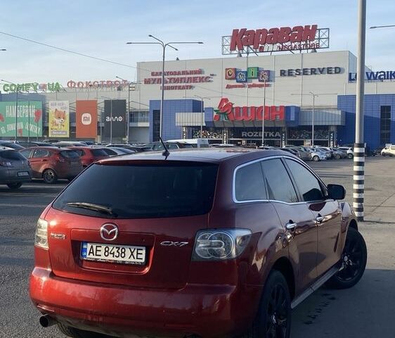 Красный Мазда СХ-7, объемом двигателя 2.3 л и пробегом 255 тыс. км за 6600 $, фото 4 на Automoto.ua