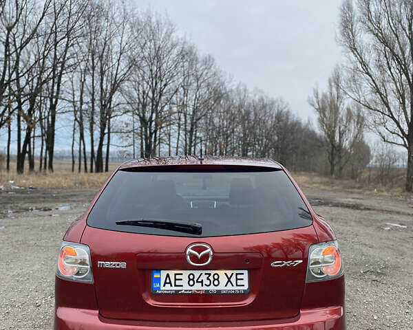 Красный Мазда СХ-7, объемом двигателя 2.3 л и пробегом 255 тыс. км за 6900 $, фото 15 на Automoto.ua